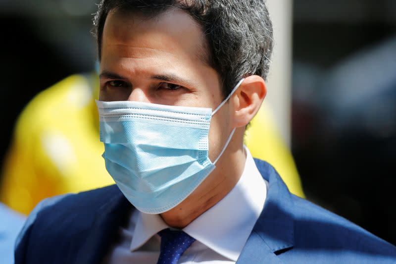 Venezuela's opposition leader Juan Guaido addresses the media the day after regional and local elections, in Caracas