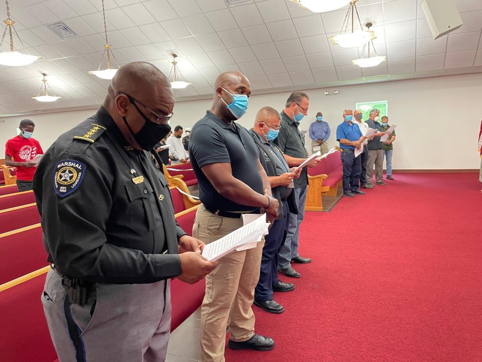 Preparing to speak during Saturday's forum in Gray are (from left) Thibodaux City Marshal Calvin Cooks, Houma Police Chief Dana Coleman, Terrebonne Sheriff Tim Soignet and Lafourche Sheriff Craig Webre.