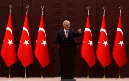 Turkey's Prime Minister Binali Yildirim addresses the media in Ankara, Turkey, June 27, 2016. REUTERS/Umit Bektas