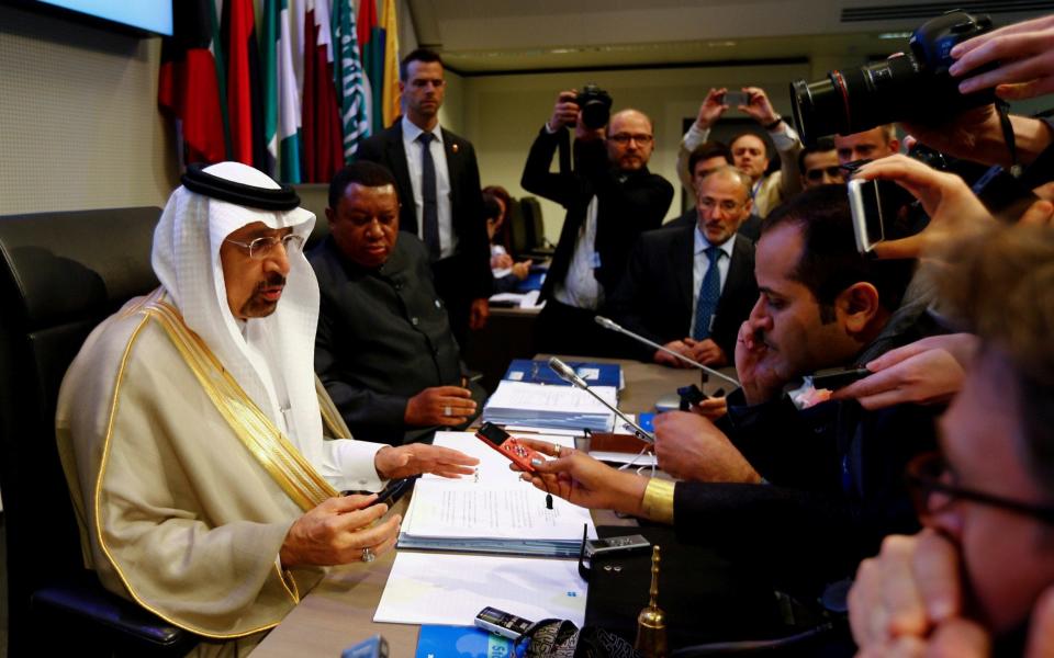 Saudi Arabia's energy minister Khalid al-Falih and OPEC secretary general Mohammed Barkindo talk to journalists before an OPEC meeting in Vienna last week - REUTERS