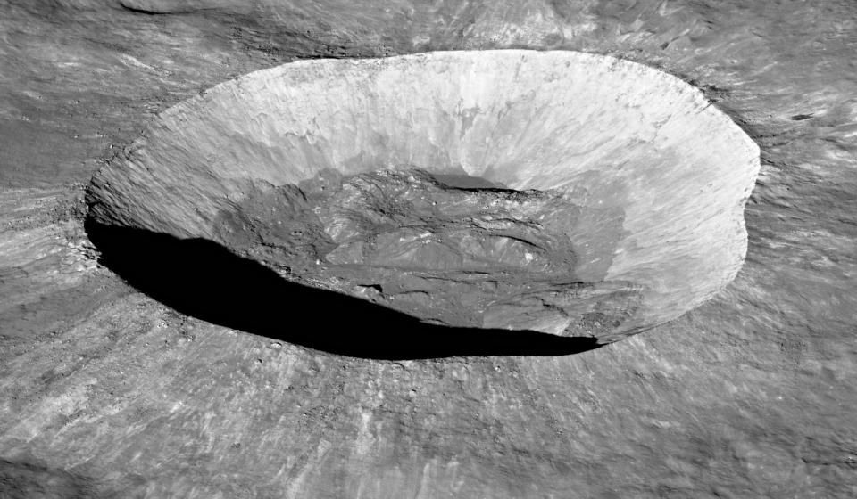 Close-up black and white photo of lunar crater