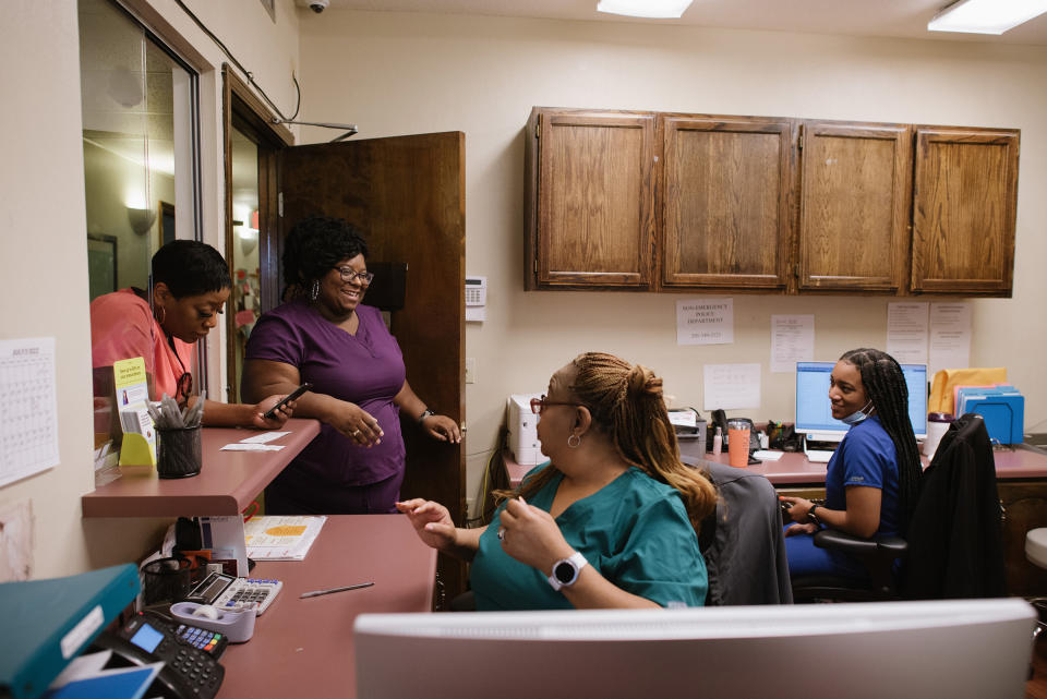 From left, Alesia Horton, Francia Webb, Gail Latham and administrative assistant Kyandria Franklin on July 21.<span class="copyright">Lucy Garrett for TIME</span>