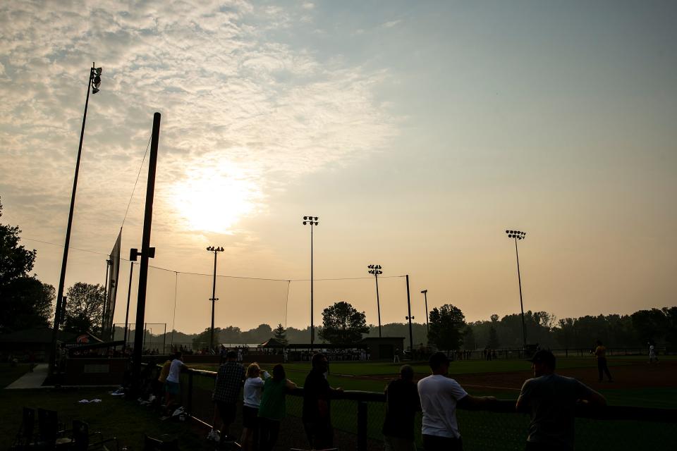 A haze of smoke from Canadian wildfires is seen during a high school baseball game between Iowa City Regina and Solon, Wednesday, June 28, 2023, at the Solon Recreation and Nature Area in Solon, Iowa.