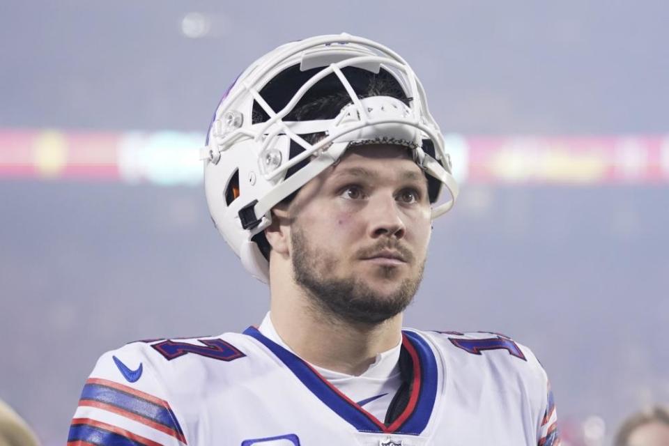 Josh Allen walks off the field after the incredible finale.