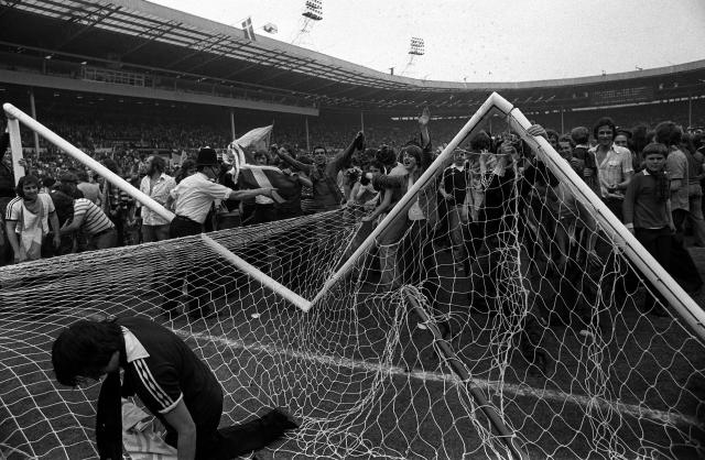 Scotland fans run wild and tear down the goalposts at Wembley after a 2-1 victory over England on June 6, 1977