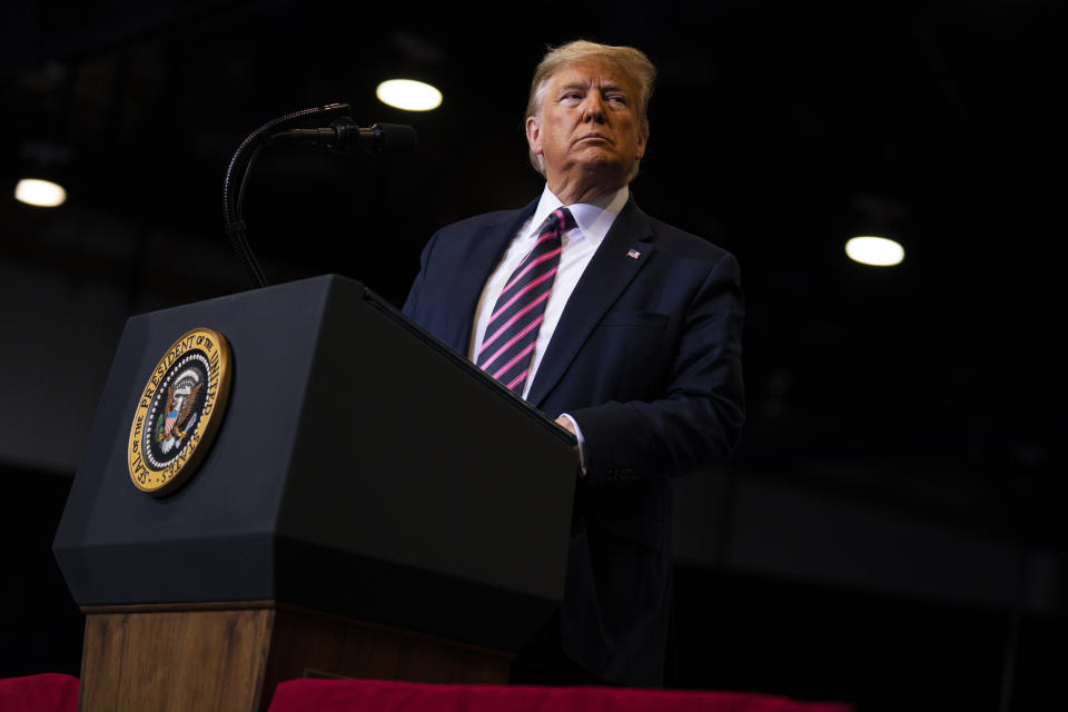 President Donald Trump pauses as he speaks during a campaign rally at the Las Vegas Convention Center, Friday, Feb. 21, 2020, in Las Vegas. (AP Photo/Evan Vucci)