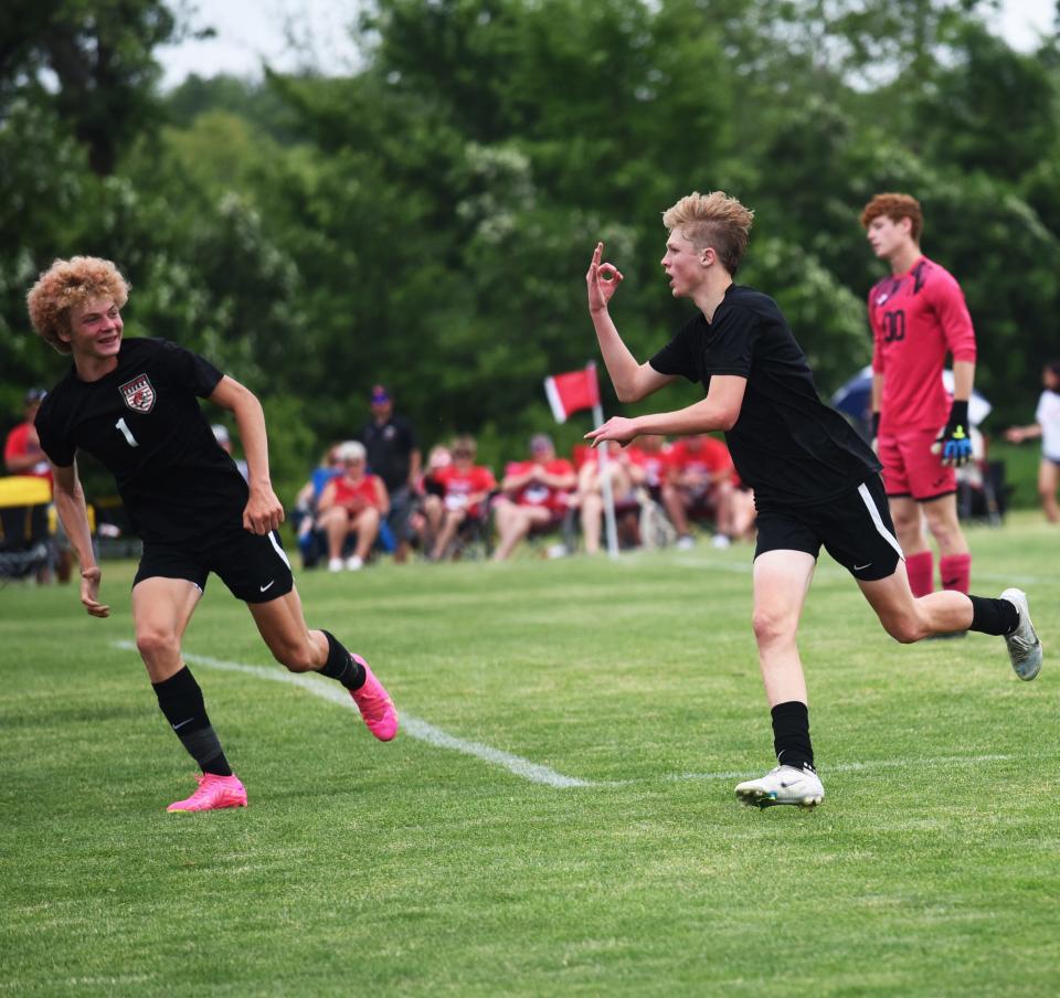 Gilbert's Tyler Holtan celebrates his third goal of the first half of the Class 2A boys state soccer quarterfinal game against Greene County on Tuesday. Gilbert won 5-0.