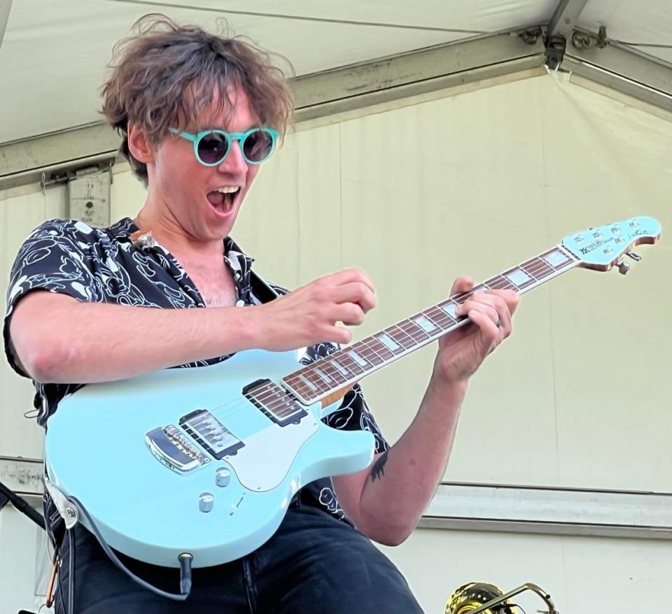 John Anthony of The VIndys plays a guitar solo at the band's Firestone Country Club concert earlier this month.