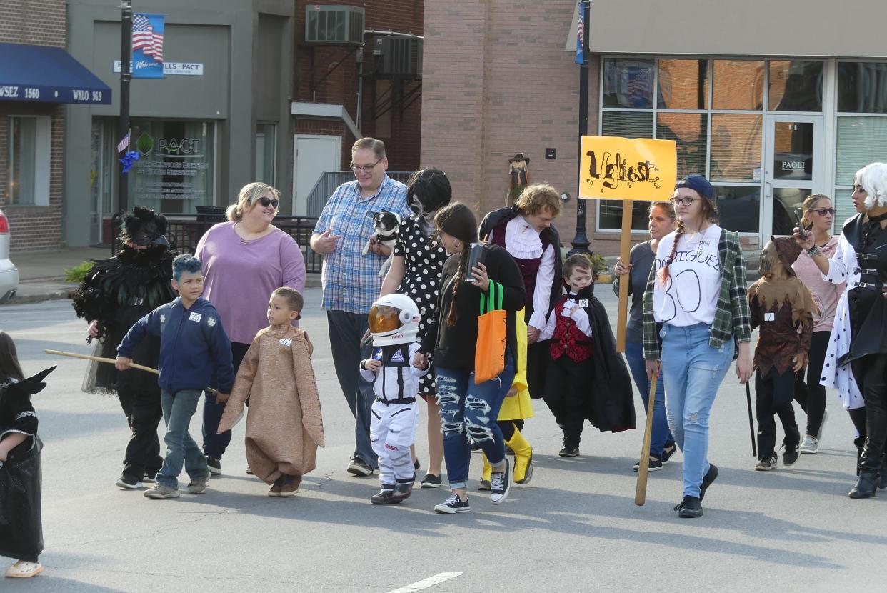 Children gathered and marched around the Orange County Courthouse Square with an escort from the Paoli Police Department during the annual Paoli Psi Iota Xi Spook Parade. Winners’ photos from the costume contest are inside.