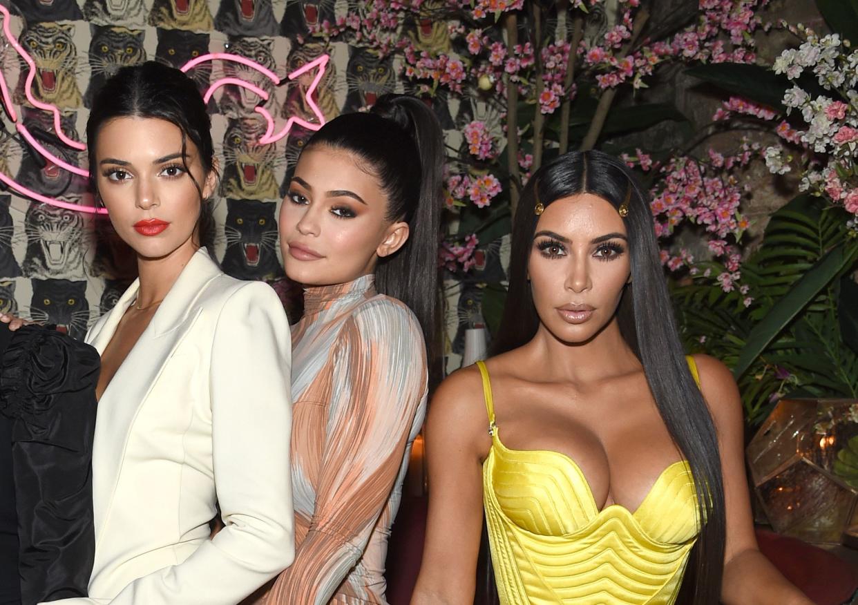 Kendall Jenner, Kylie Jenner and Kim Kardashian pose together at an event in New York City. 