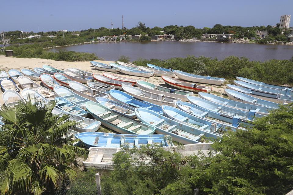 Boats lie on land for protection in preparation for the arrival of Hurricane Beryl in Progreso, Mexico, Thursday, July 4, 2024. (AP Photo/Martin Zetina)