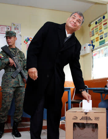 Ecuador's President Rafael Correa casts his vote at school used as a polling station during the presidential election, in Quito, Ecuador April 2, 2017. REUTERS/Carlos Noriega