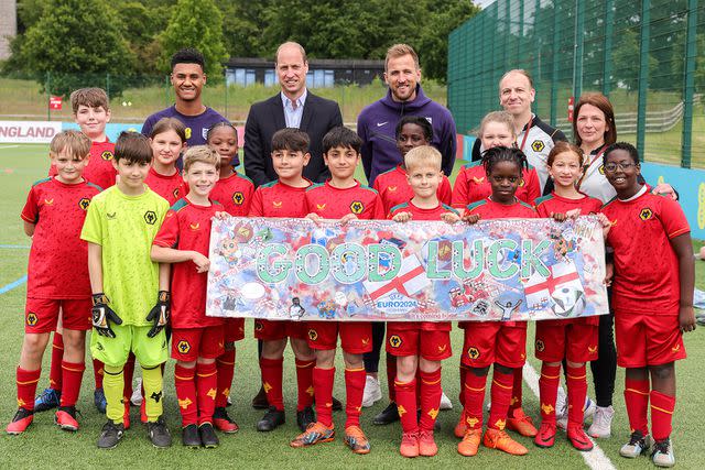 <p>Andrew Parsons / Kensington Palace</p> Prince William visits young soccer players on June 10, 2024