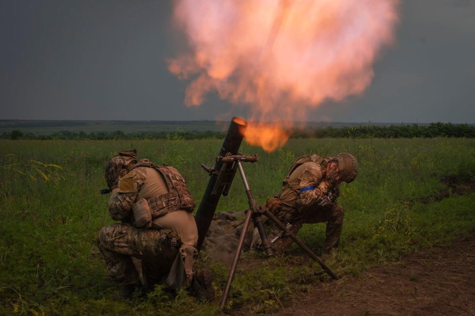 Ukrainian soldiers fire toward Russian position on the frontline in Zaporizhzhia region, Ukraine, Saturday, June 24, 2023.