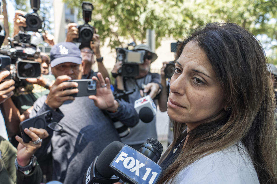 Nancy Iskander speaks outside Van Nuys Courthouse on Monday, June 10, 2024, in Van Nuys, Calif., after attending the sentencing hearing in the murder trial of Rebecca Grossman, who is charged in the deaths of their two sons, Mark, 11, and Jacob, 8. Grossman was sentenced Monday to 15 years to life in prison for the hit-and-run deaths of the two young brothers in a crosswalk. (AP Photo/Damian Dovarganes)