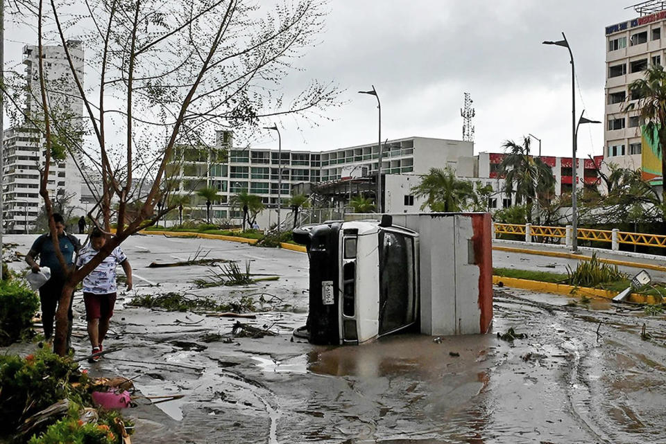 An overturned truck after the passage of Hurricane Otis in Acapulco, Mexico, on October 25, 2023. (Francisco Robles / AFP - Getty Images)