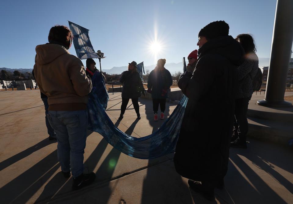 Members of the Great Salt Lake vigil group pause and talk while walking the grounds of the Capitol in Salt Lake City on Tuesday, Jan. 30, 2024. The group walks around the grounds every morning as part of its vigil. | Jeffrey D. Allred, Deseret News