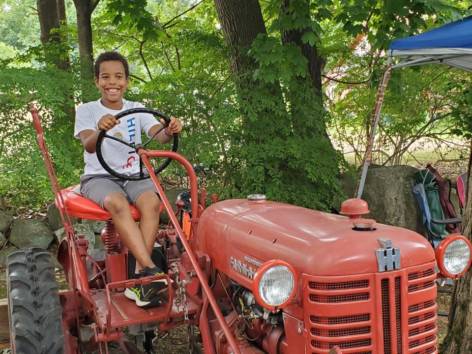 Shawn Chapin, 9, of Stratham, was more than ready to try his skills as a future farmer during the Stratham 4-H Summerfest at Stratham Hill Park Saturday, July 16, 2022.
