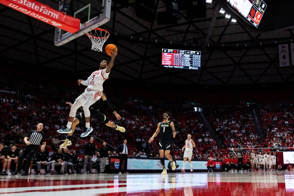 Utah Utes guard Deivon Smith (5) shoots a basket during the men’s college basketball game between the Utah Utes and the Colorado Buffaloes at the Jon M. Huntsman Center in Salt Lake City on Saturday, Feb. 3, 2024. The teams are tied 31-31 at half-time. | Megan Nielsen, Deseret News