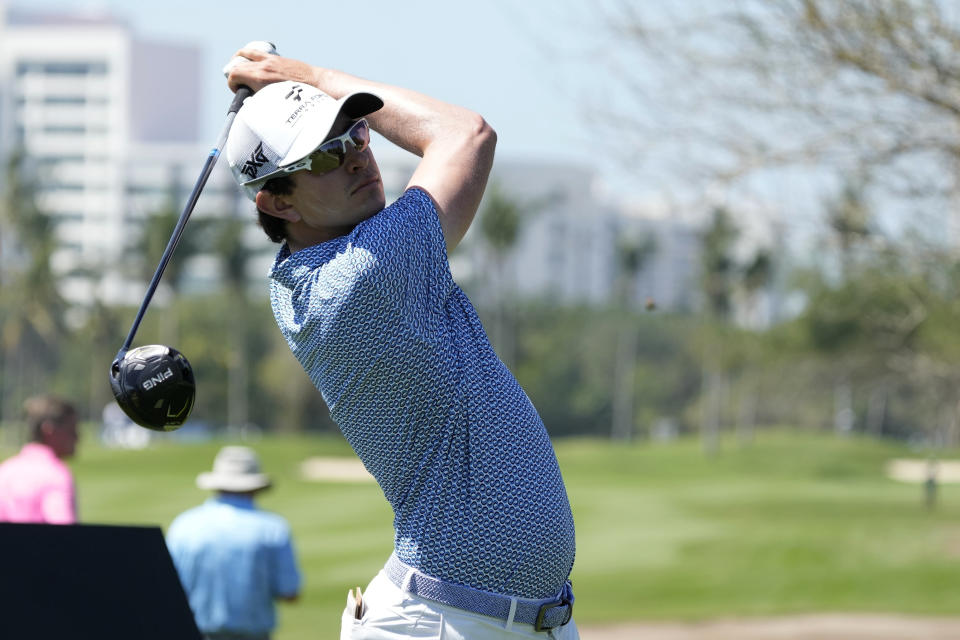 Nico Echavarria, of Colombia, watches his tee shot on the second hole during the first round of the Mexico Open golf tournament in Puerto Vallarta, Mexico, Thursday, Feb. 22, 2024. (AP Photo/Fernando Llano)