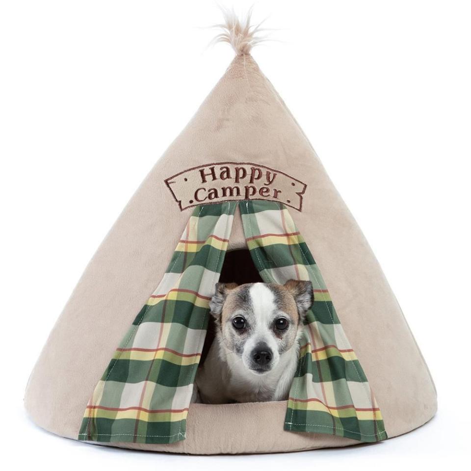 <p><strong>Happy Camper</strong></p><p>bestfriendsbysheri.com</p><p><strong>$34.95</strong></p><p><a href="https://bestfriendsbysheri.com/products/happy-camper-novelty-hut-microplush-one-size?variant=19575023468601&gclid=CjwKCAjwsan5BRAOEiwALzomX-i0oeWMXkrv7QdnoxTdcrp_hLkLSlR-N8vWnD7Eva3C0TXlMBZhzBoCnfsQAvD_BwE" rel="nofollow noopener" target="_blank" data-ylk="slk:Shop Now;elm:context_link;itc:0;sec:content-canvas" class="link ">Shop Now</a></p><p>Let's face it, anyone can appreciate some extra privacy, and your pet is no exception. Allow them to draw back the curtains on this tent-inspired bed for some much needed alone time. </p>