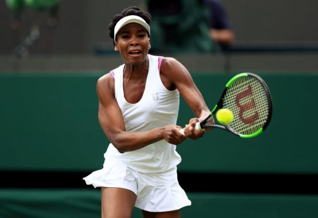 Venus Williams breaks Wimbledon's 'all white' rule in bright pink bra