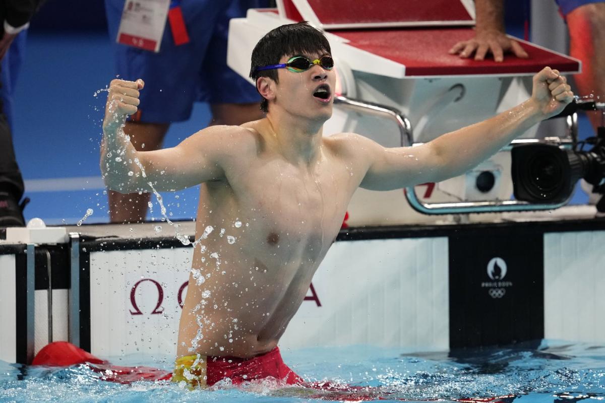 Pan Zhanle of China breaks own world record to win Olympic gold medal in men’s 100-meter freestyle