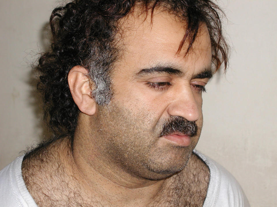 9/11 mastemind Khalid Sheikh Mohammed during his arrest in 2003. 