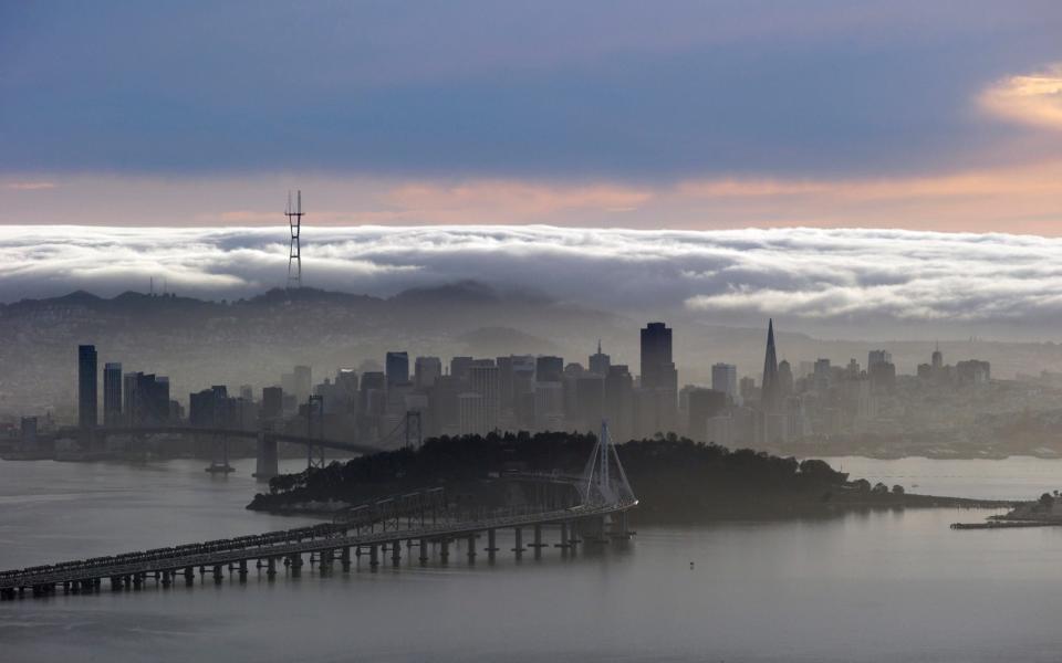 A blanket of fog covers the San Francisco skyline in a view from the Berkeley Hills Sunday, Feb. 28, 2016, in Berkeley, California - Marcio Jose Sanchez/AP