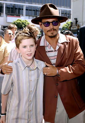 Freddie Highmore and Johnny Depp at the LA premiere of Warner Bros. Pictures' Charlie and the Chocolate Factory