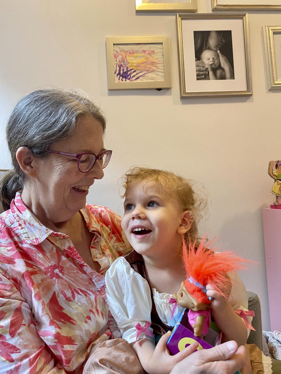 This image released by Elisa Pupko shows Mary Pupko with her granddaughter Evelyn. Pupko, a 64-year-old retired seamstress with multiple sclerosis, moved to Brooklyn from Seattle to be closer to her family. (Elisa Pupko via AP)