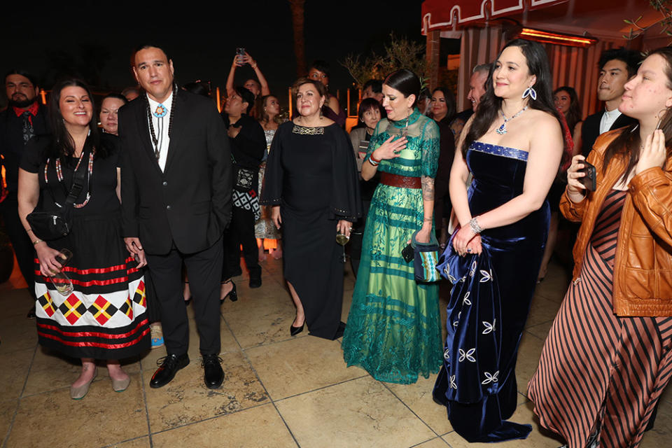 Members of the Osage Nation delegation perform at the Apple Original Films Oscars celebration at the Sunset Tower Hotel on March 10, 2024 in Los Angeles, California.