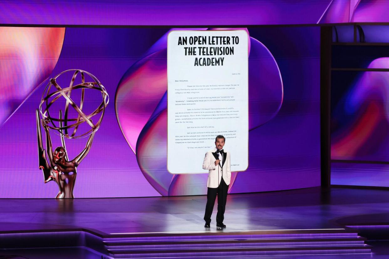 John Leguizamo onstage at the 2024 Emmys.