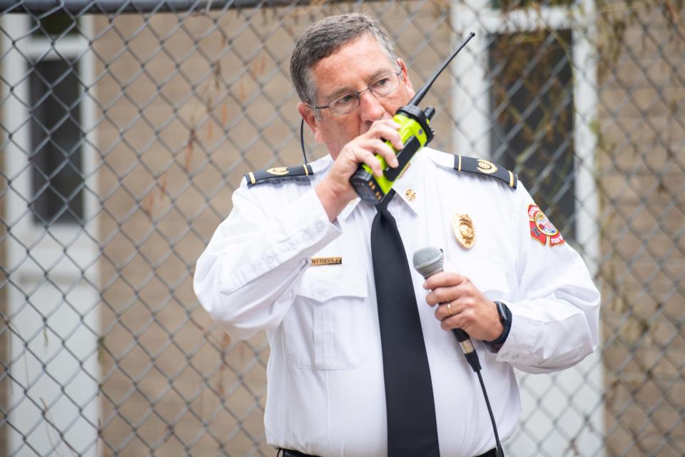 JFD Fire Chief Don Friddle radios in the Baby Box dropoff for the first time during the unveiling of the Safe Haven Baby Box at Jackson Fire Department Station 2 in Jackson, Tenn. on Sept. 13, 2023.