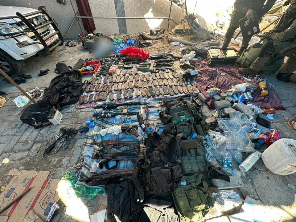 A photo released by the Israel Defense Forces shows weapons the IDF says were discovered at the Al-Shifa hospital in Gaza City. / Credit: Israel Defense Forces photo