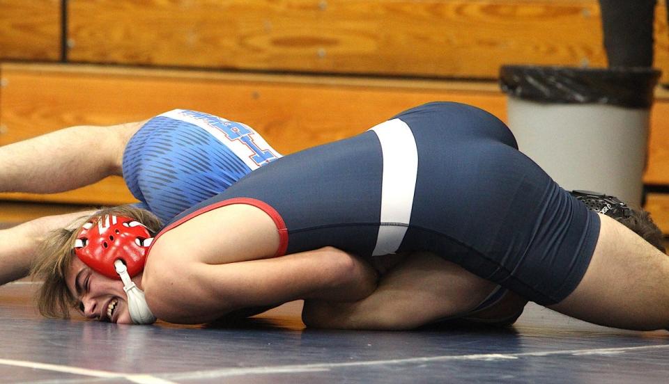 BNL sophomore Jaxon Powell tries to gain leverage on Jennings County's John Troupe en route to a pin at 160 pounds Saturday during the HHC Tournament.