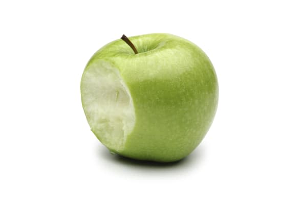 Single green apple in white background.