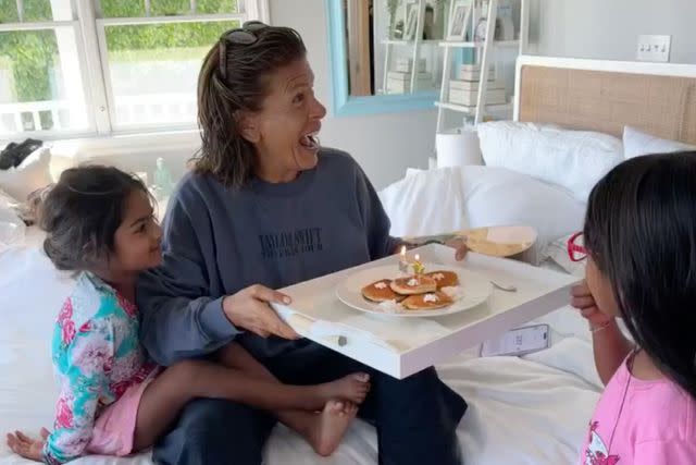 <p>Hoda Kotb/Instagram</p> Hoda Kotb's two daughters presented her with breakfast in bed for her 59th birthday in August.