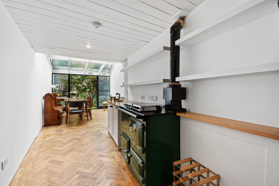 The kitchen has an Aga which fuels the central heating. (Winkworth)