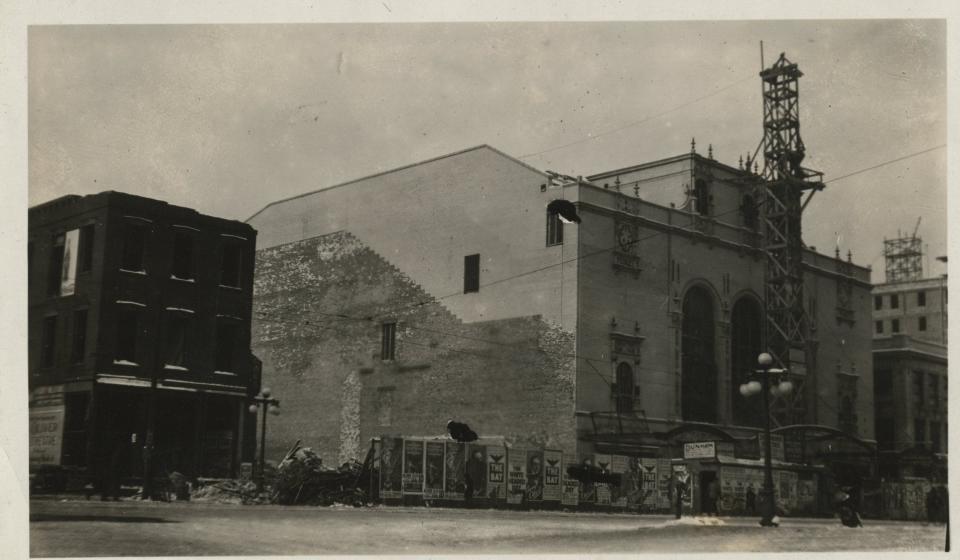 This undated photo provided by The History Museum shows the Palace Theater under construction in South Bend from the southeast view across Michigan Street. The fencing in front of the Palace advertises a play called "The Bat," which came out in 1920. The theater opened Nov. 2, 1922, as the Palace Theater and was called the Morris Civic Auditorium from 1959 to 2000. It is now the Morris Performing Arts Center.