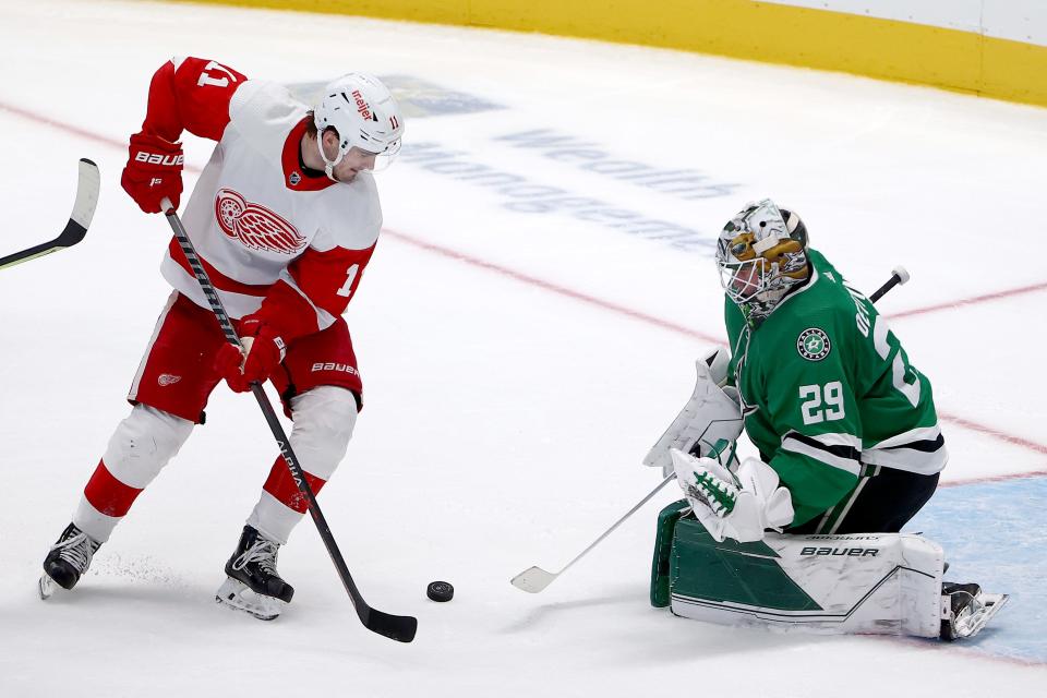 Stars goalie Jake Oettinger blocks a shot on goal against Red Wings forward Filip Zadina in the third period of the Wings' 5-2 loss on Tuesday, Nov. 16, 2021, in Dallas.