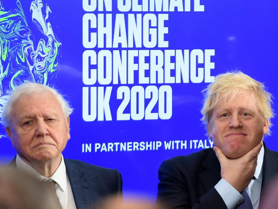 Boris Johnson and David Attenborough attend an event to launch the UN Climate Change conference, COP26, in central London on 4 February, 2020 (POOL/AFP via Getty Images)