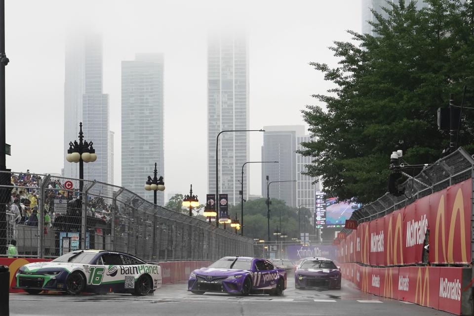 AJ Allmendinger drives during a NASCAR Cup Series auto race at the Grant Park 220 Sunday, July 2, 2023, in Chicago. (AP Photo/Morry Gash)