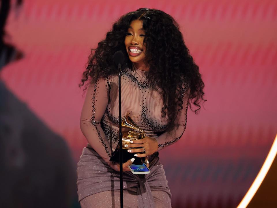 SZA accepts her 2024 Grammy Award for "Best R&B Song."