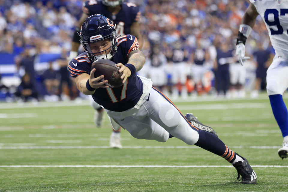 INDIANAPOLIS, INDIANA – AUGUST 19: Tyson Bagent #17 of the Chicago Bears dives for a touchdown during the second quarter in the preseason game against the <a class="link " href="https://sports.yahoo.com/nfl/teams/indianapolis/" data-i13n="sec:content-canvas;subsec:anchor_text;elm:context_link" data-ylk="slk:Indianapolis Colts;sec:content-canvas;subsec:anchor_text;elm:context_link;itc:0">Indianapolis Colts</a> at Lucas Oil Stadium on August 19, 2023 in Indianapolis, Indiana. (Photo by Justin Casterline/Getty Images) ORG XMIT: 775992225 ORIG FILE ID: 1626214013