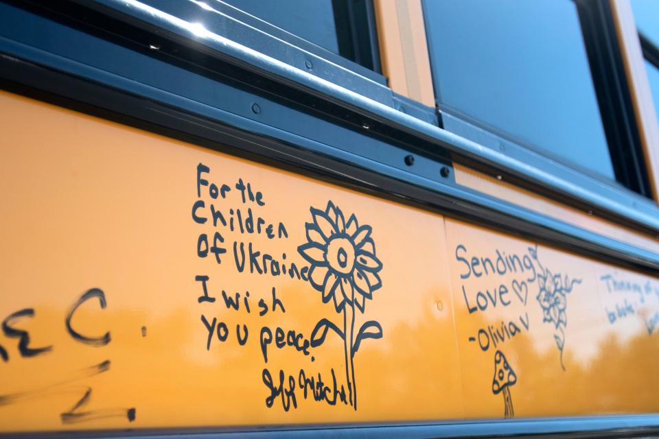 Notes signed on a Levy School Bus Company school bus by Quakertown school bus drivers before it is donated to the Solomonova School District in Ukraine in front of American Heritage Credit Union in Quakertown on Thursday, August 18, 2022. 