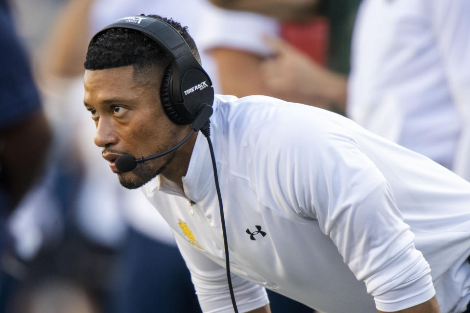 Notre Dame head coach Marcus Freeman stands on the sidelines during the second half of an NCAA college football game against UNLV, Saturday, Oct. 22, 2022, in South Bend, Ind. (AP Photo/Marc Lebryk)