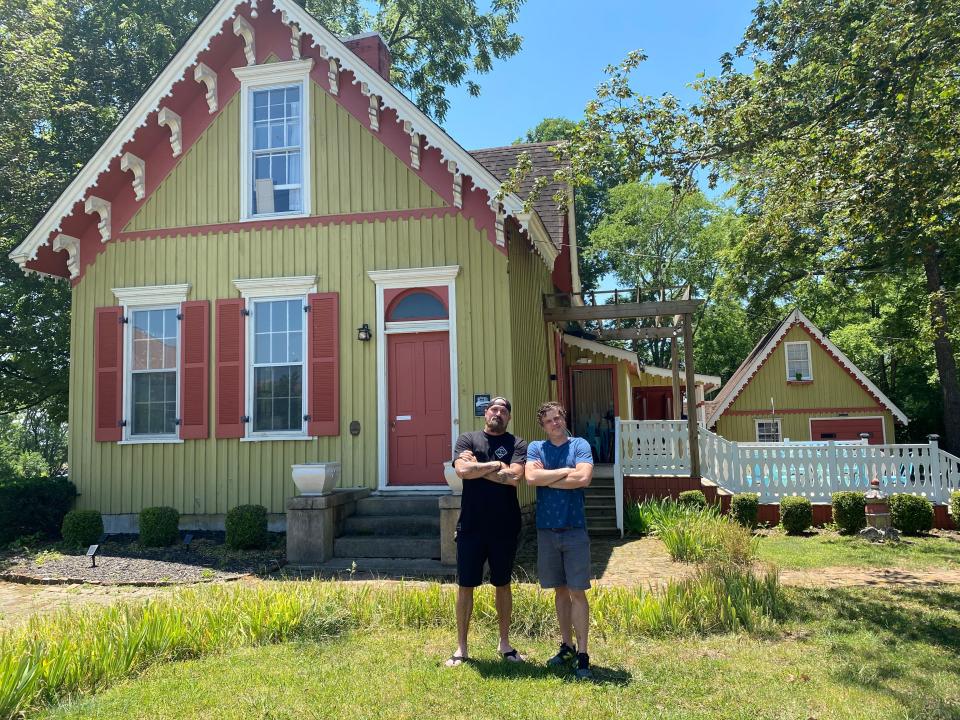 Josh Batovsky and Bill Benedict team up outside the historic, Kissing House, 412 McLemore Ave., in Spring Hill on June 26, 2023. Their dual paired business concepts will feature a daytime brunch and after hours beer garden and adult lounge concept.