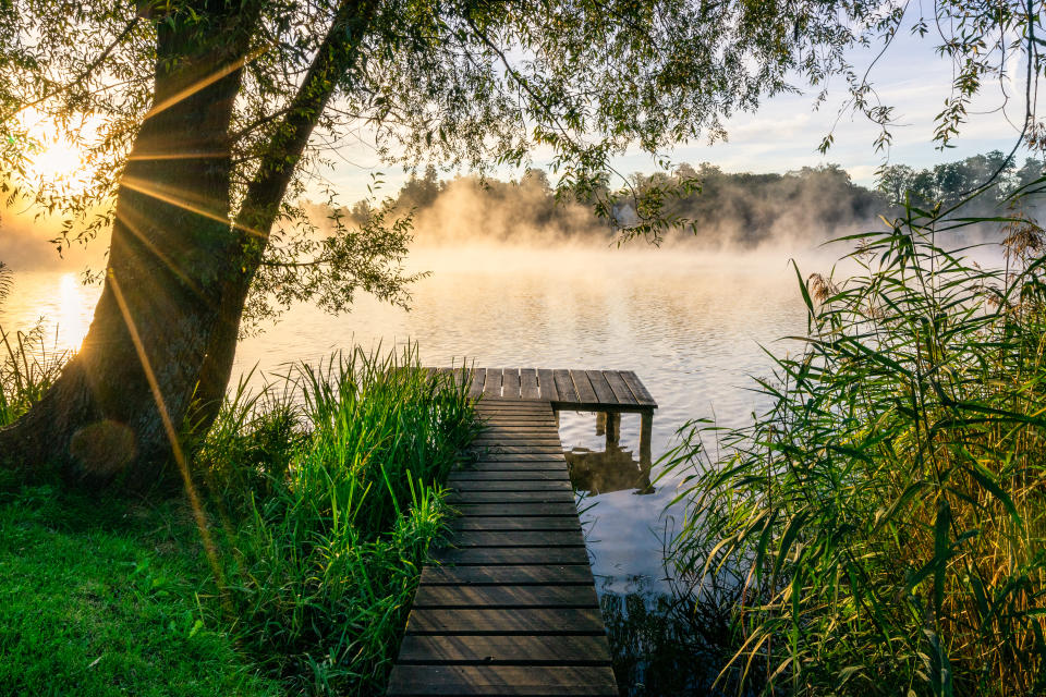 Sunrise at a little lake in Wessling, Starnberg, Upper Bavaria, Germany.