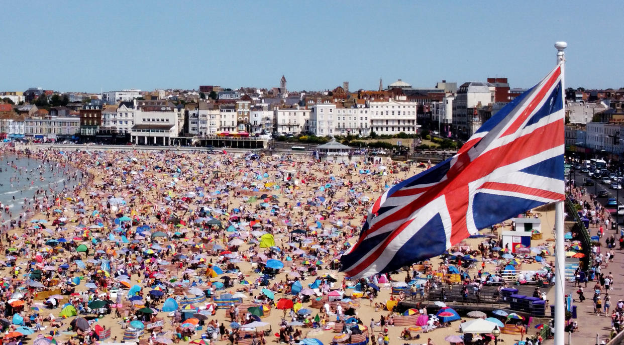 A view of people on the beach in Margate, Kent. Temperatures are predicted to hit 31C across central England on Sunday ahead of record-breaking highs next week. Picture date: Sunday July 17, 2022.